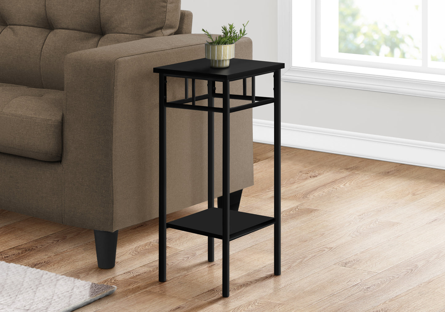 Sleek black metal accent table with two tiers ideal for small spaces