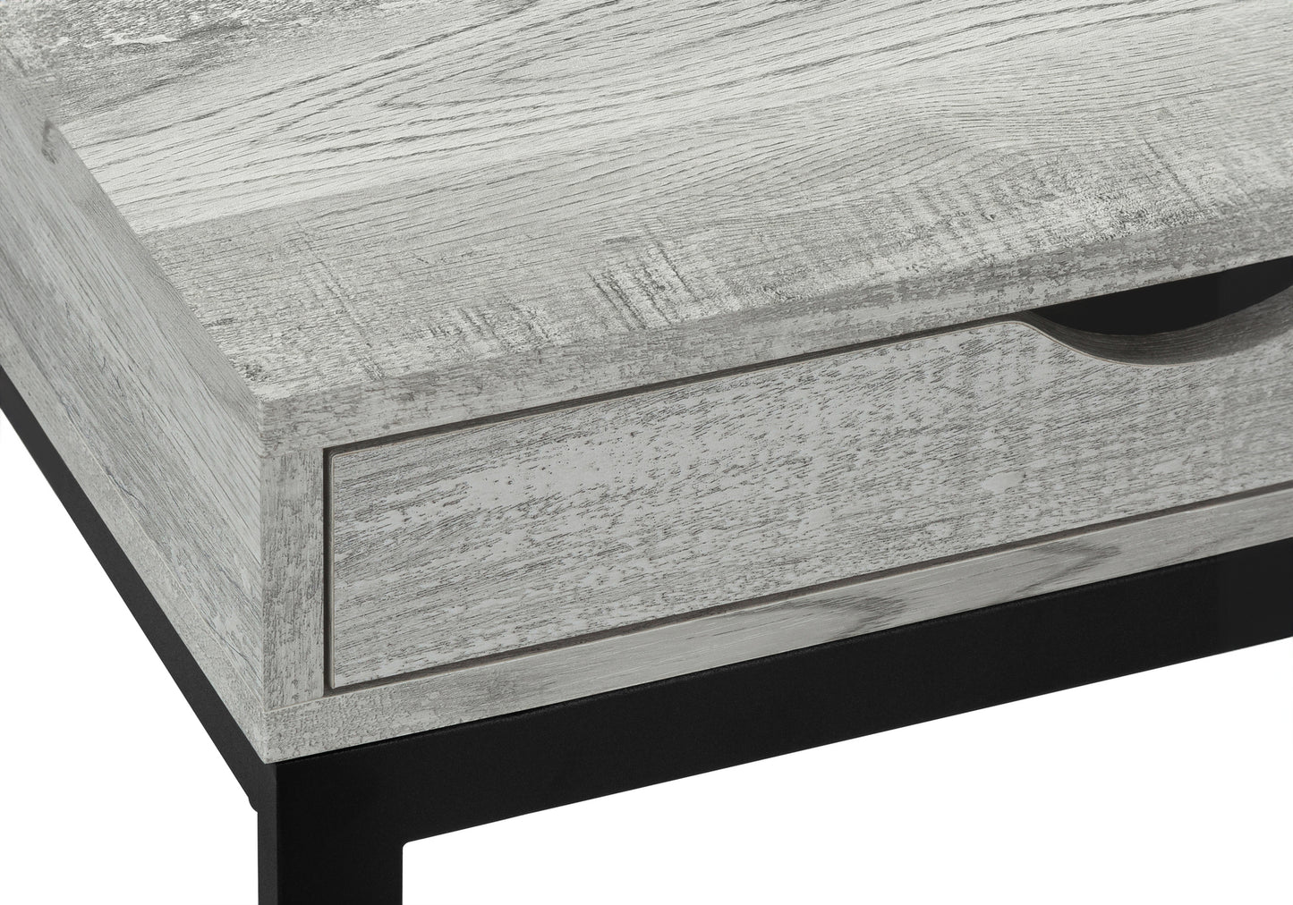 Distressed wood grain texture on a gray coffee table with a black metal frame and drawer