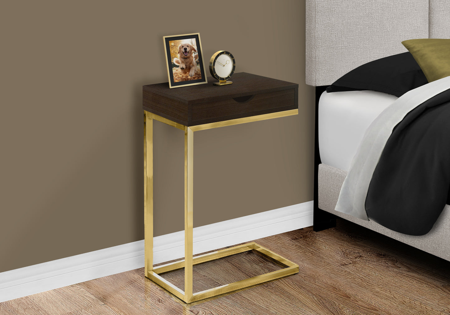 Dark wood Ctable with gold frame perfect for bedside use