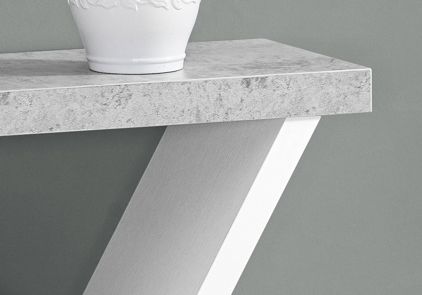 Modern grey concrete effect console table top with textured white ceramic vase accent