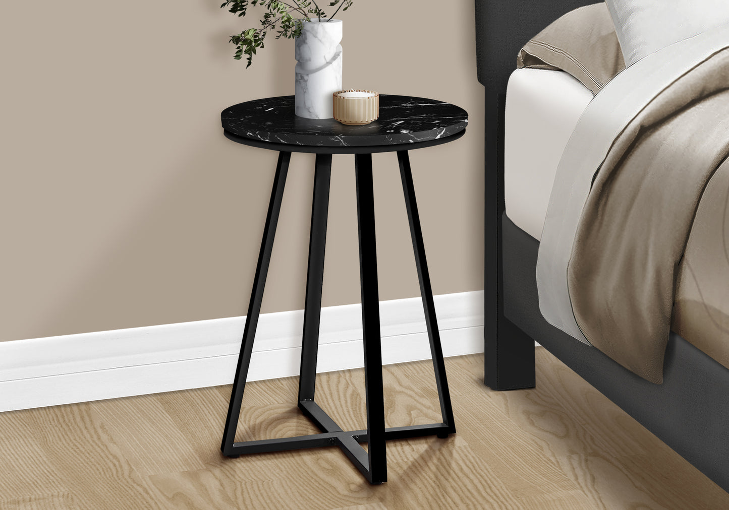 Round black marble top side table with matte black metal legs ideal for bedroom nightstands