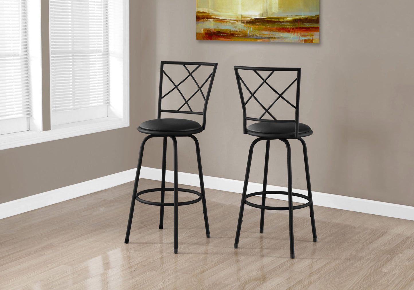 Black metal swivel bar stool with diamondpatterned back and padded seat