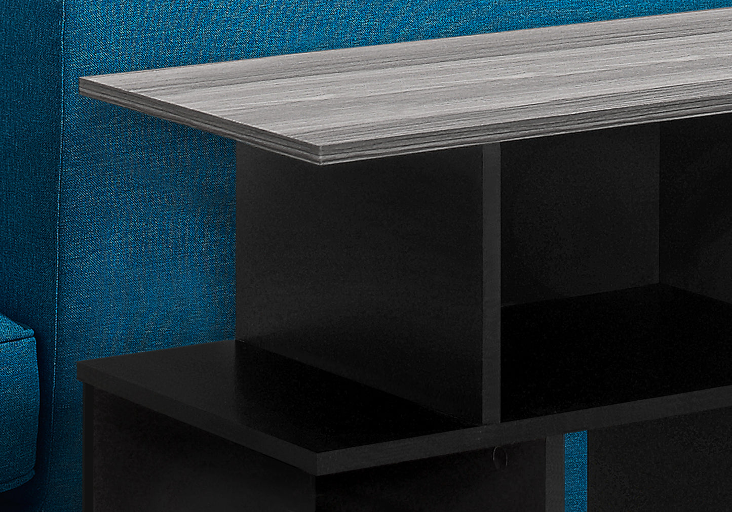 Modern gray wood grain top shelf on black modular shelving unit for home decor