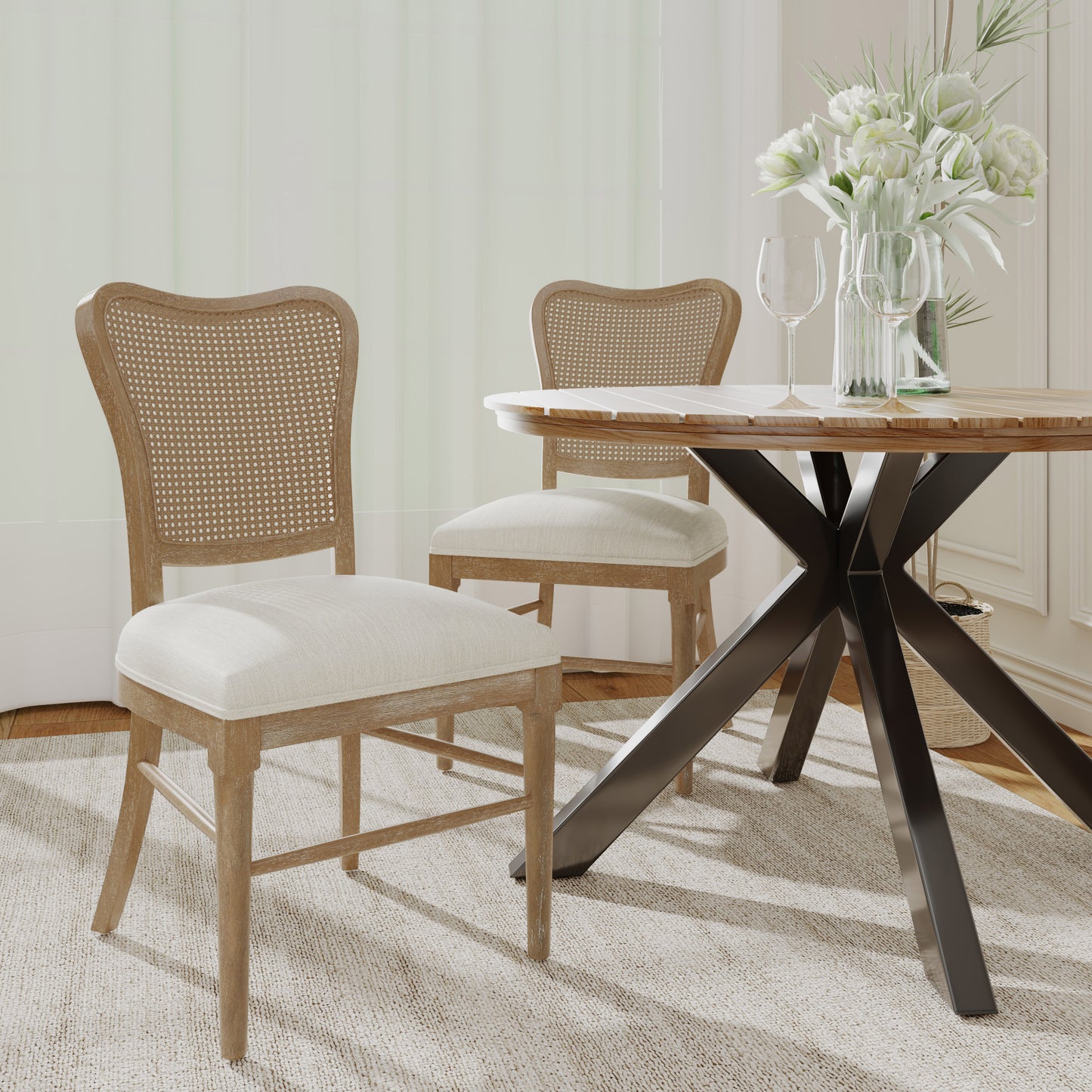 Cane back dining chair with light oak wood frame and upholstered seat perfect for a French country dining room