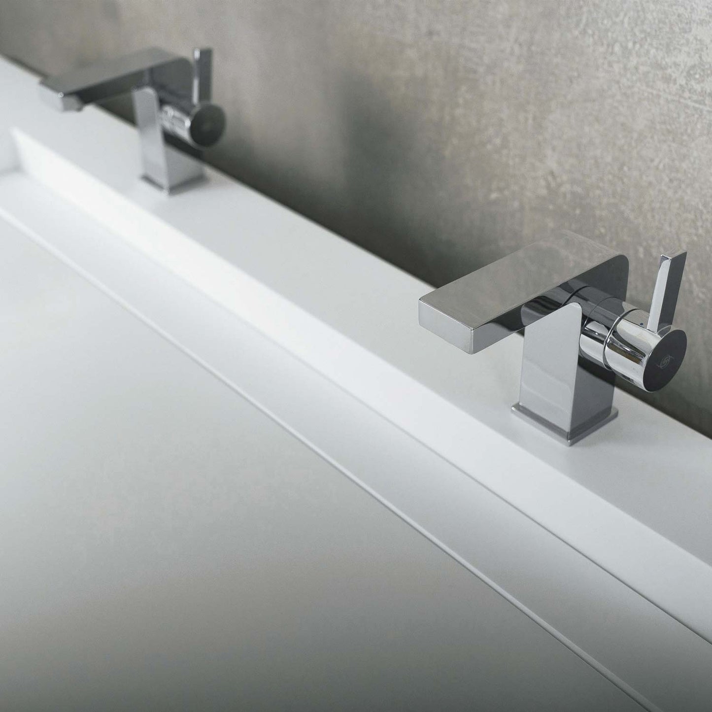 Modern chrome basin faucet with minimalist square design and single lever control