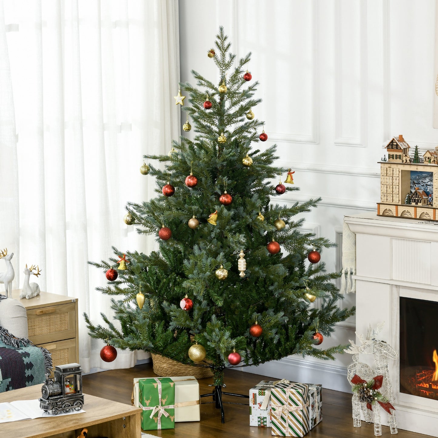 Green artificial Christmas tree with red and gold ornaments and a gold star topper
