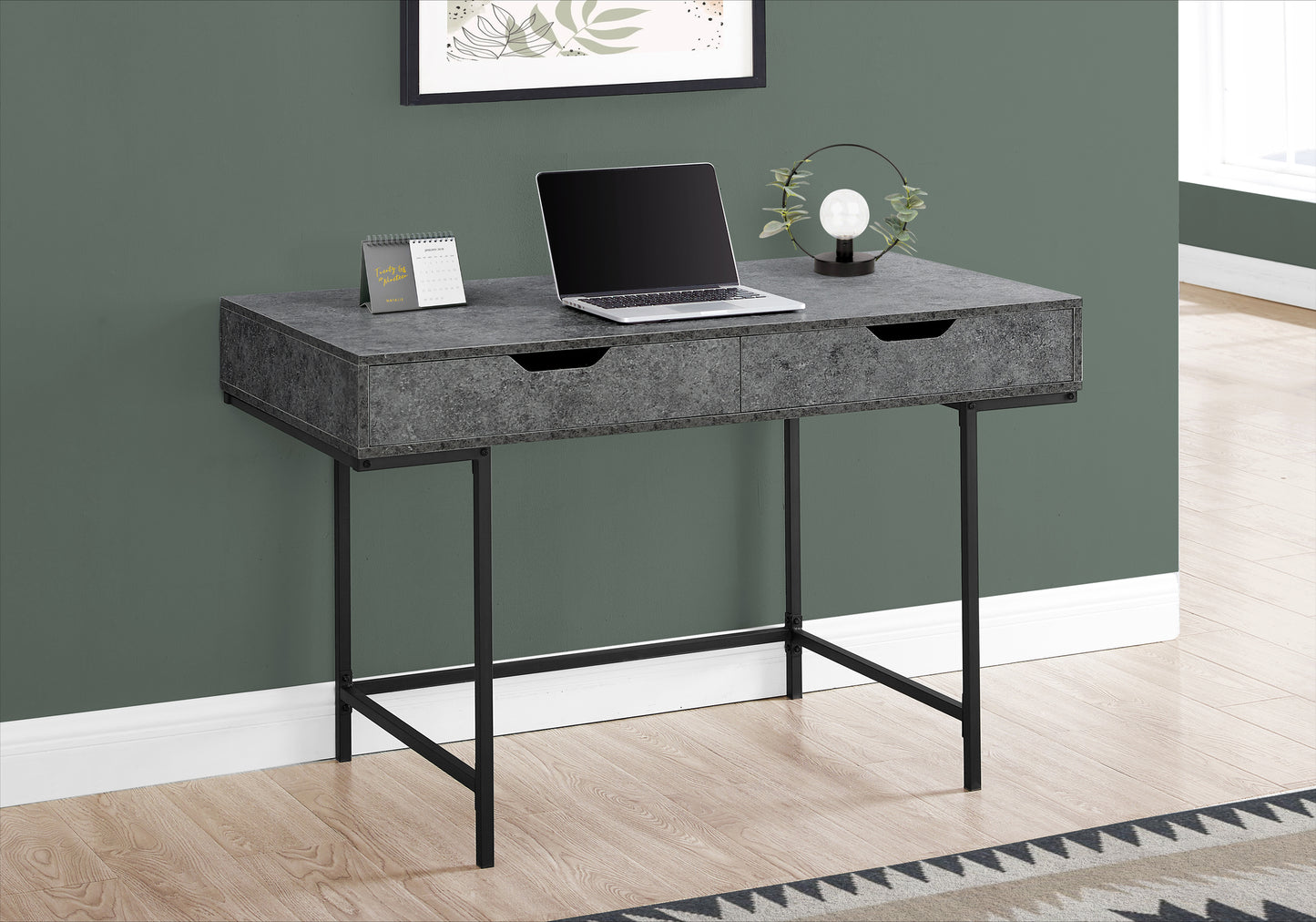 Modern gray concrete desk with dual drawers and black metal legs perfect for a minimalist home office