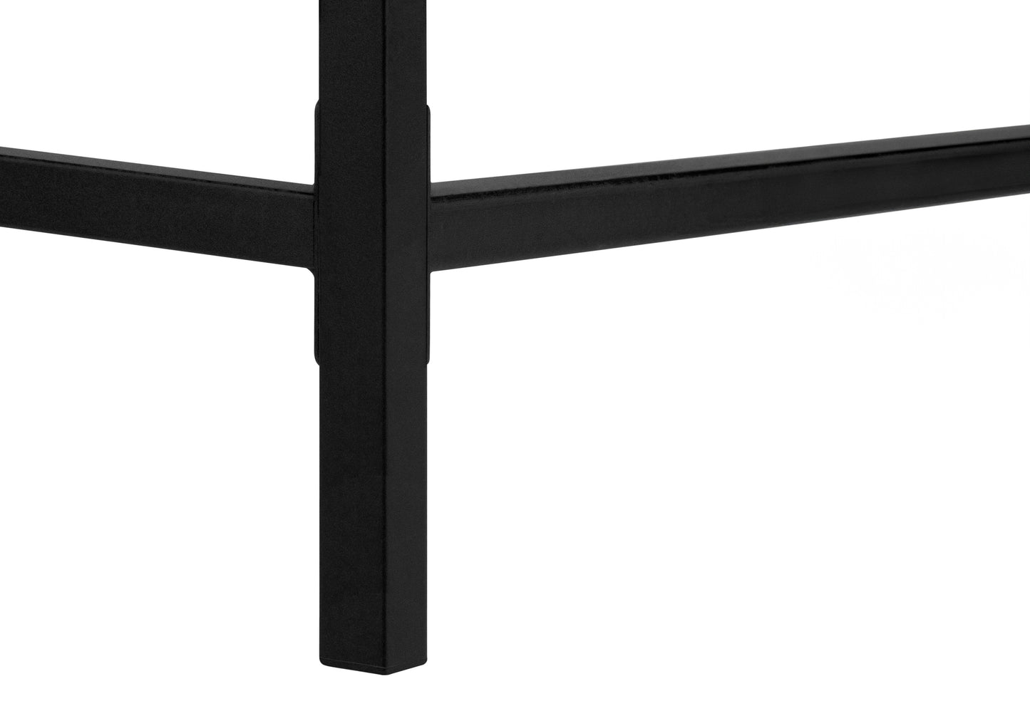 Closeup of a black metal table leg structure with clean lines