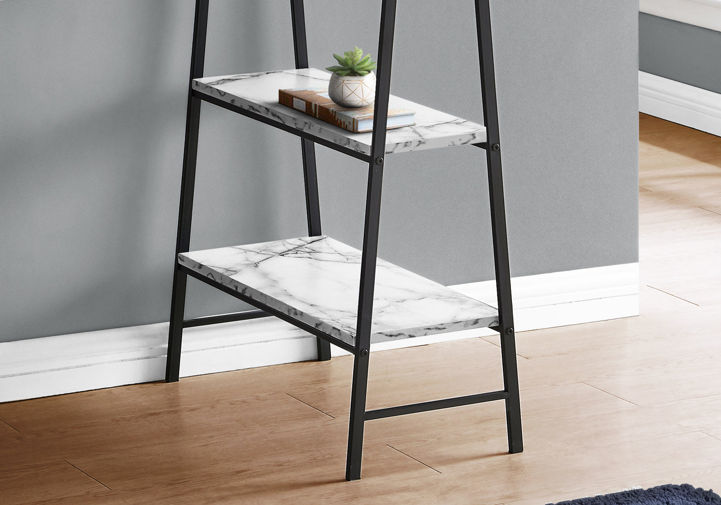 Black metal frame leaning bookshelf with white marble pattern shelves
