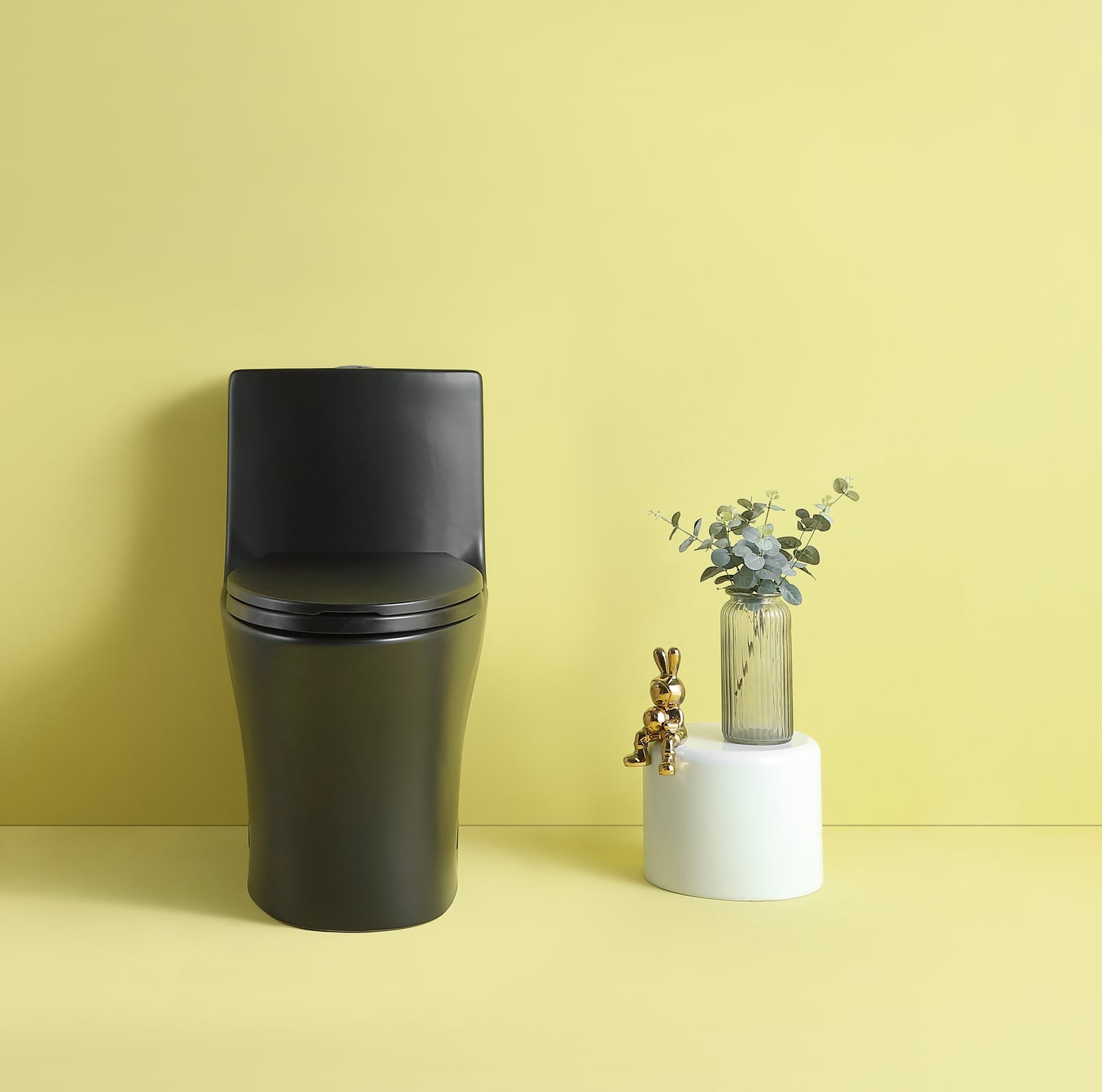 Sleek black skirted toilet with softclose seat modern bathroom fixture