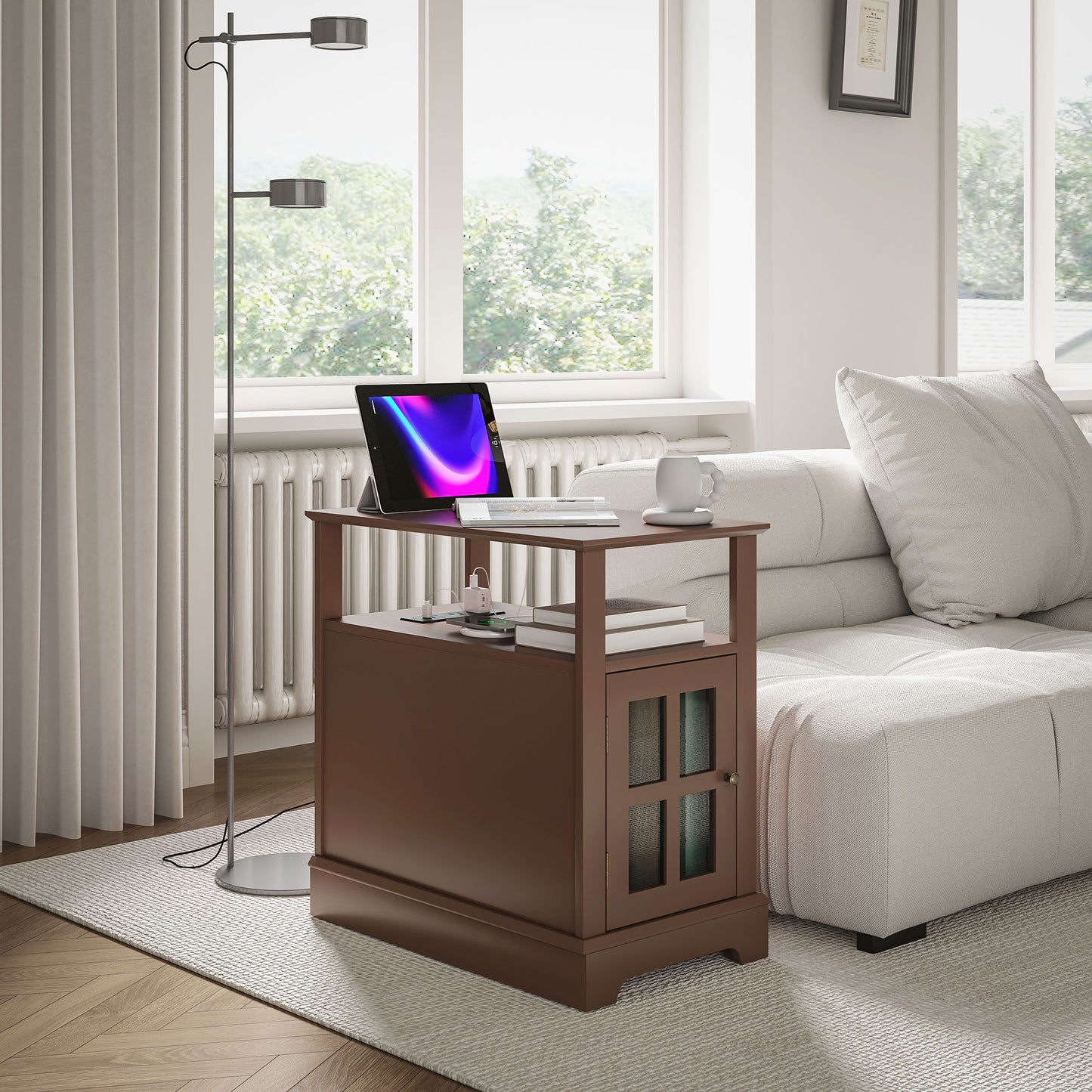 Compact brown end table with cabinet and open shelves holding a laptop and books