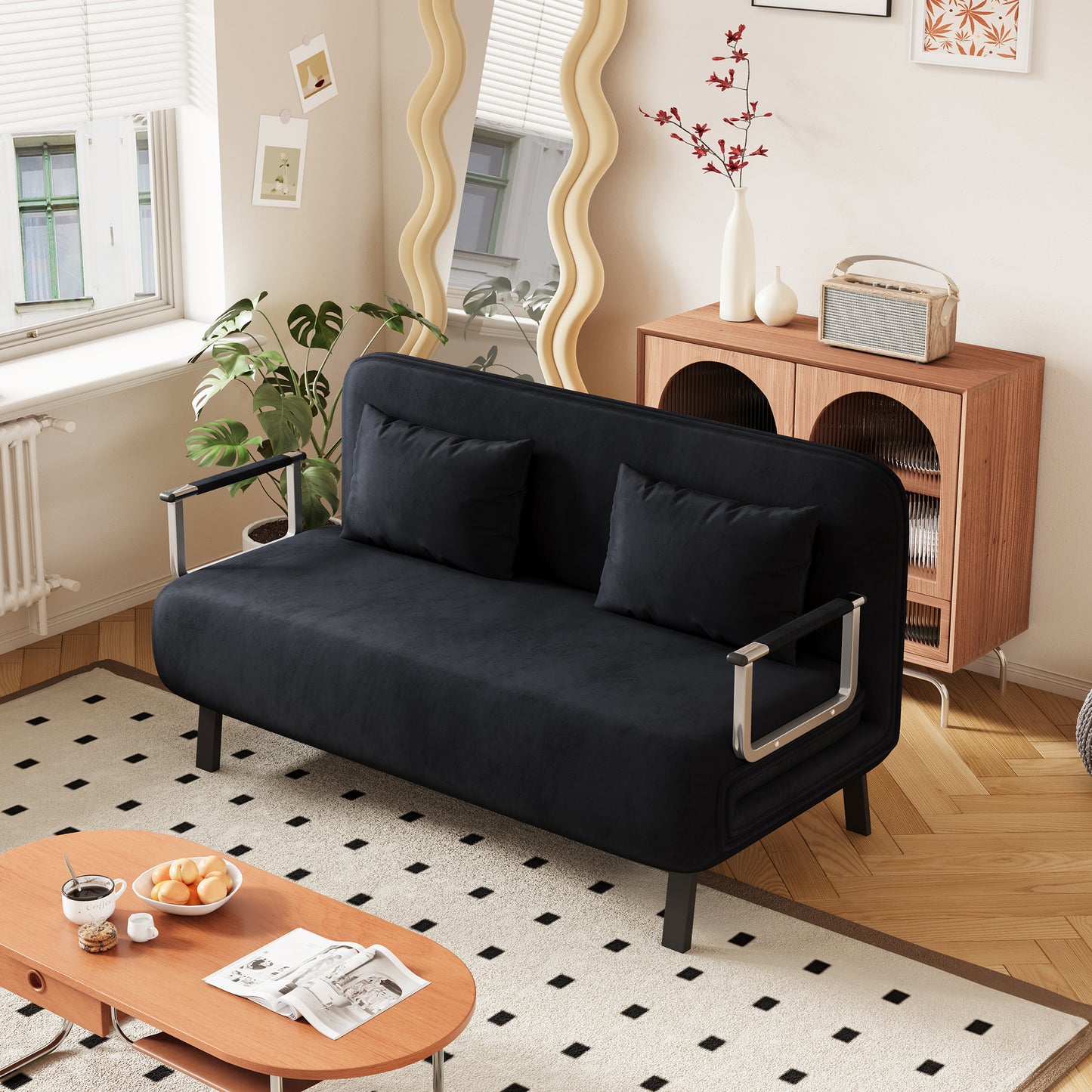 Black velvet futon sofa with chrome accents two plush pillows perfect for small apartments