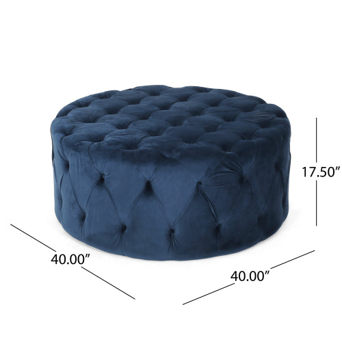 Navy blue velvet tufted round ottoman with diamond button detailing