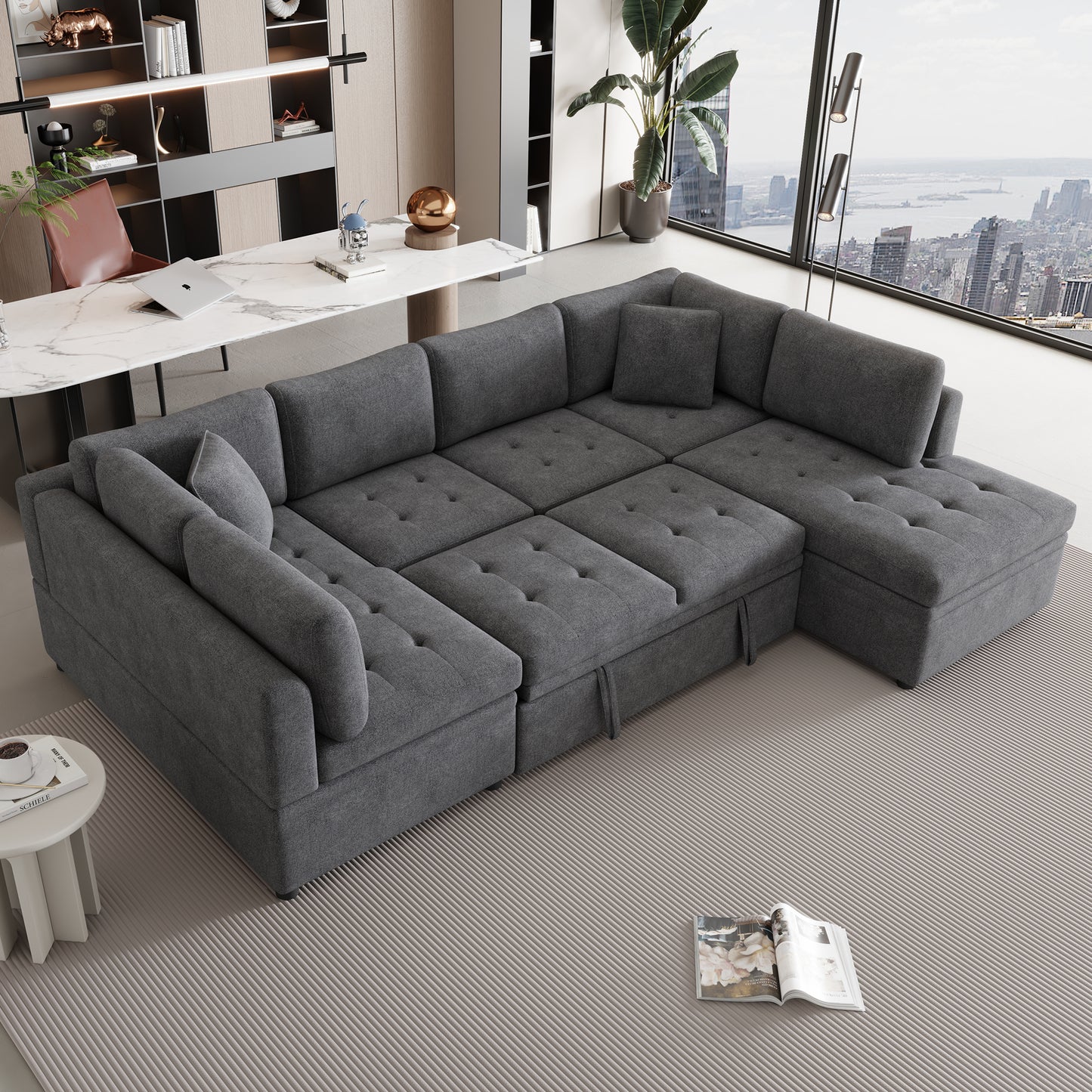 Dark grey tufted sectional sofa with storage chaise and matching pillows