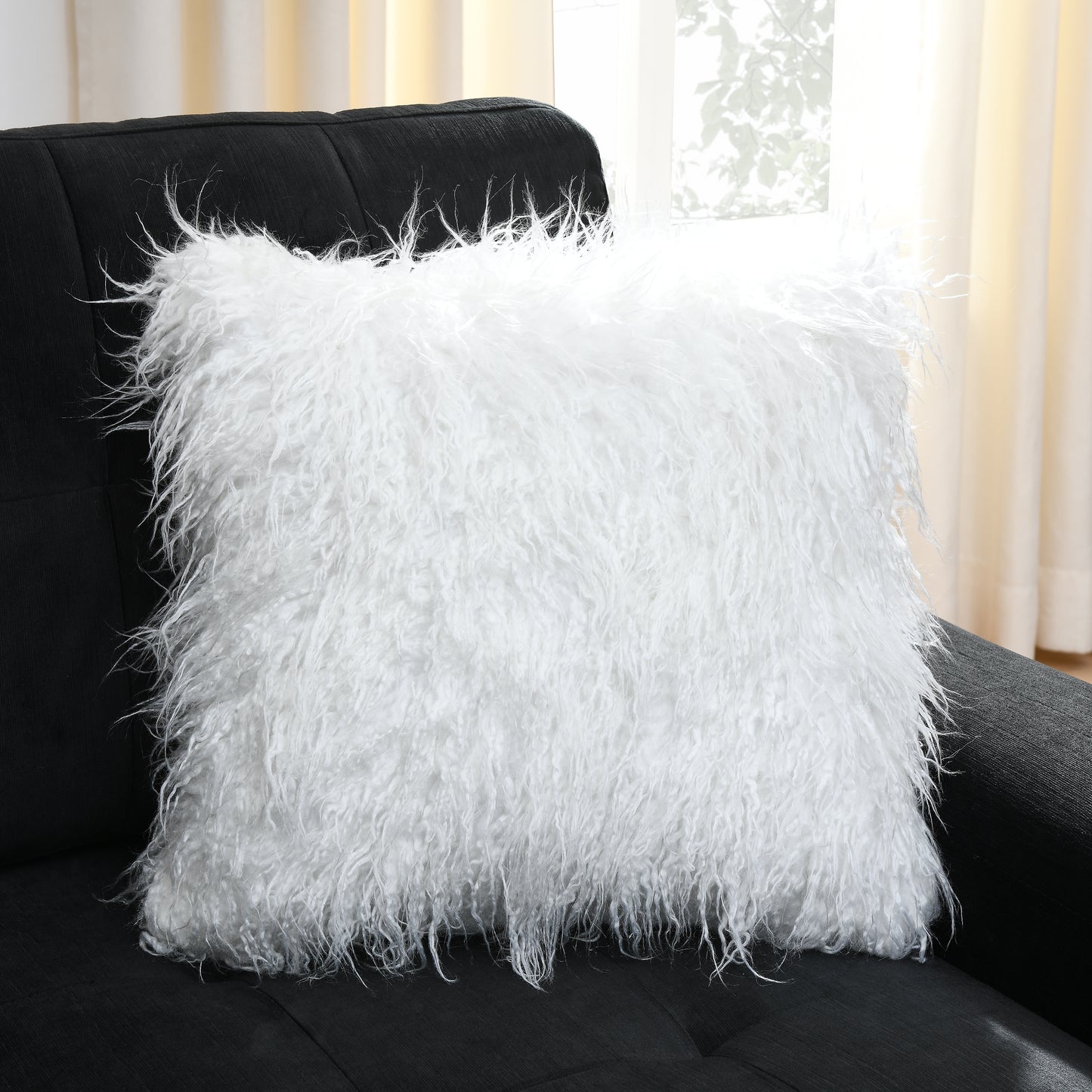White Mongolian faux fur throw pillow with shaggy texture