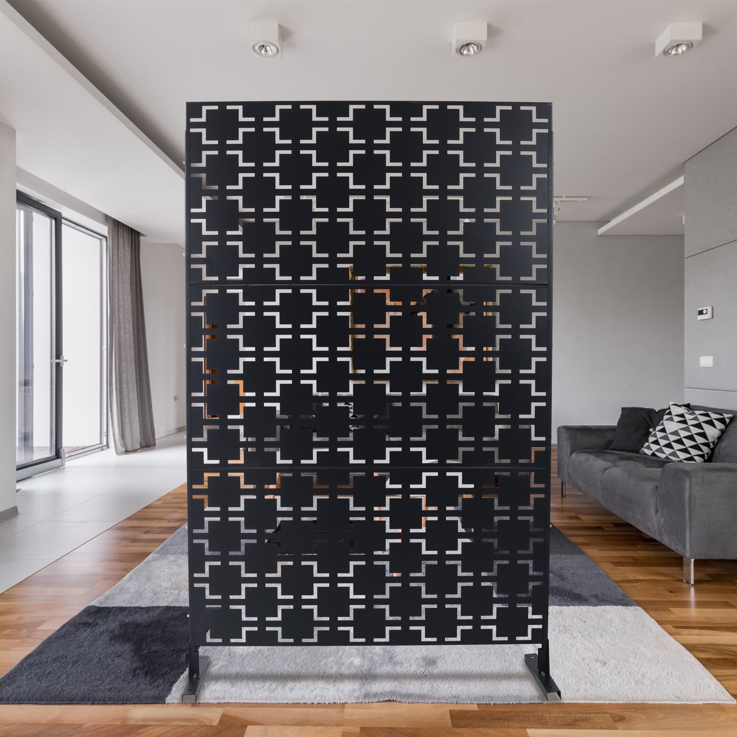 Modern black decorative room divider screen with a geometric pattern and silver accents