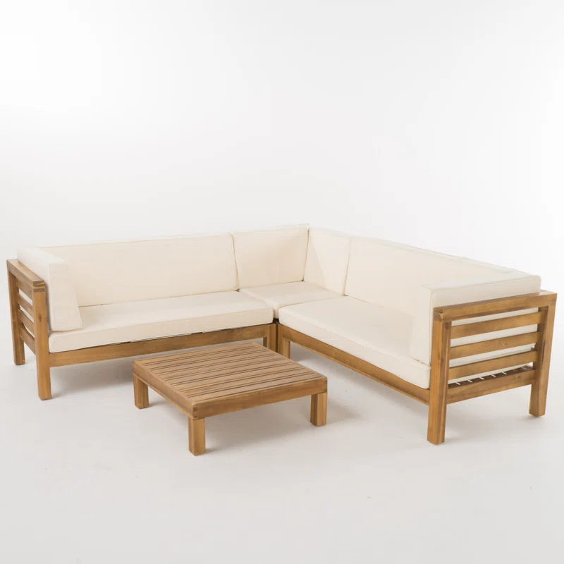 Acacia wood outdoor sectional sofa with cream cushions and slatted coffee table