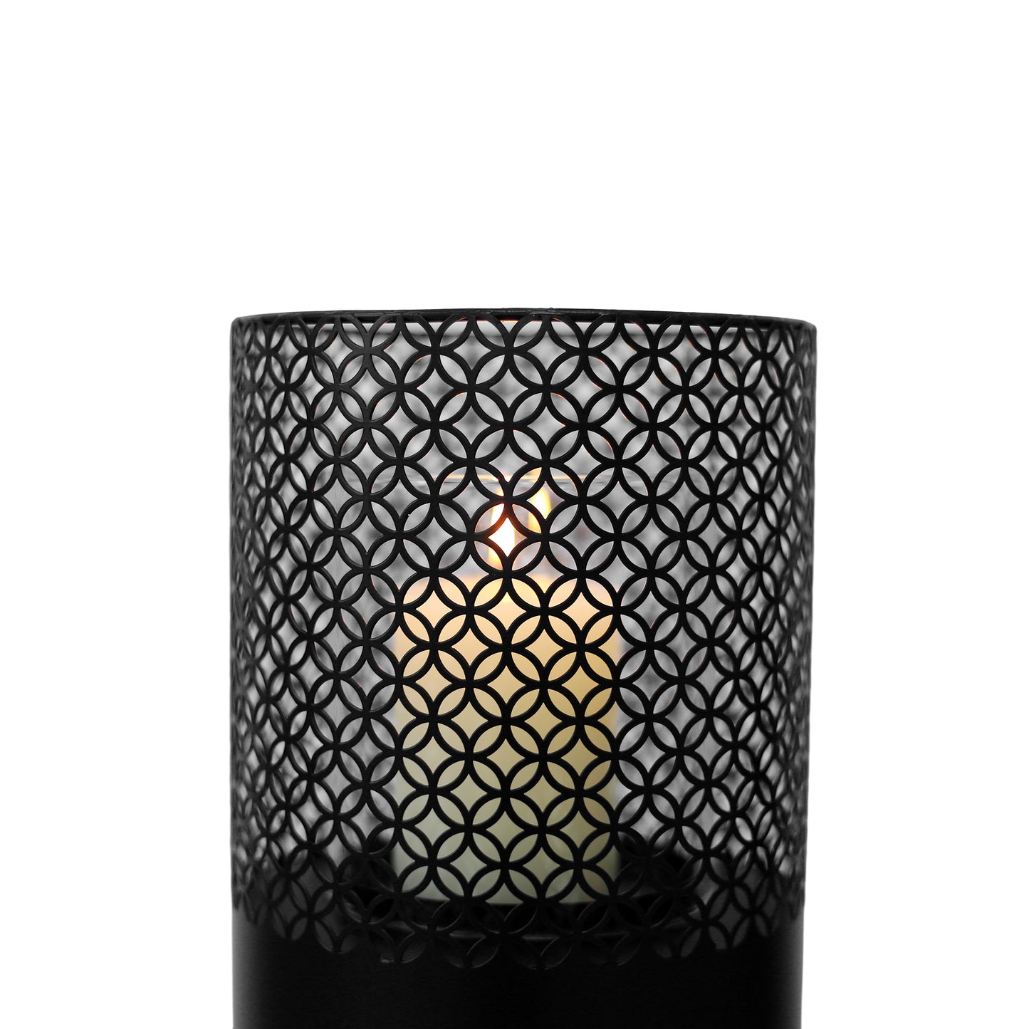 Black metal lantern with intricate circular pattern showcasing a lit candle inside