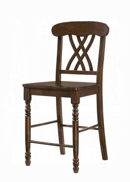 Dark brown wooden bar stool with crisscross backrest and turned legs