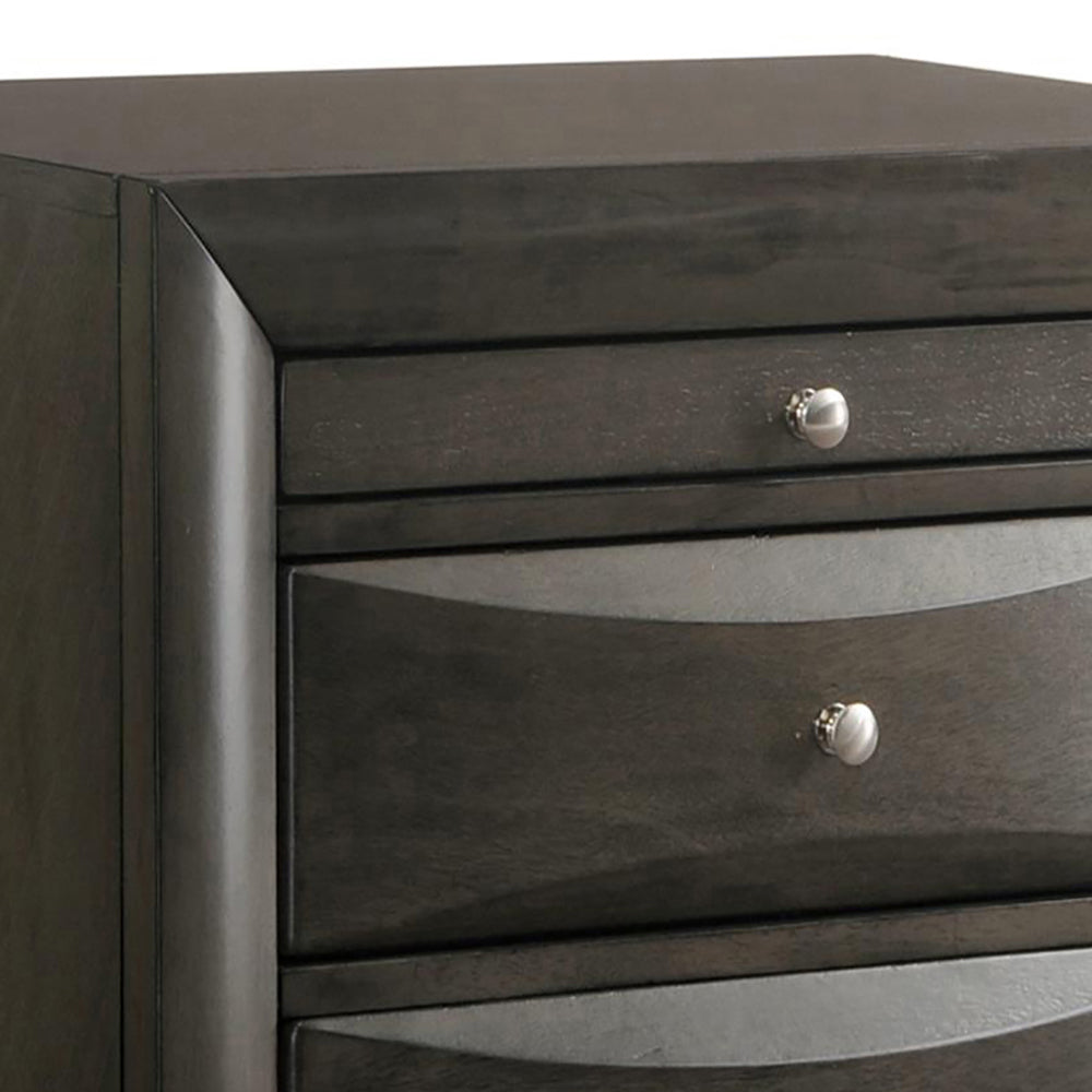 Dark gray wood nightstand with three drawers and silver knobs