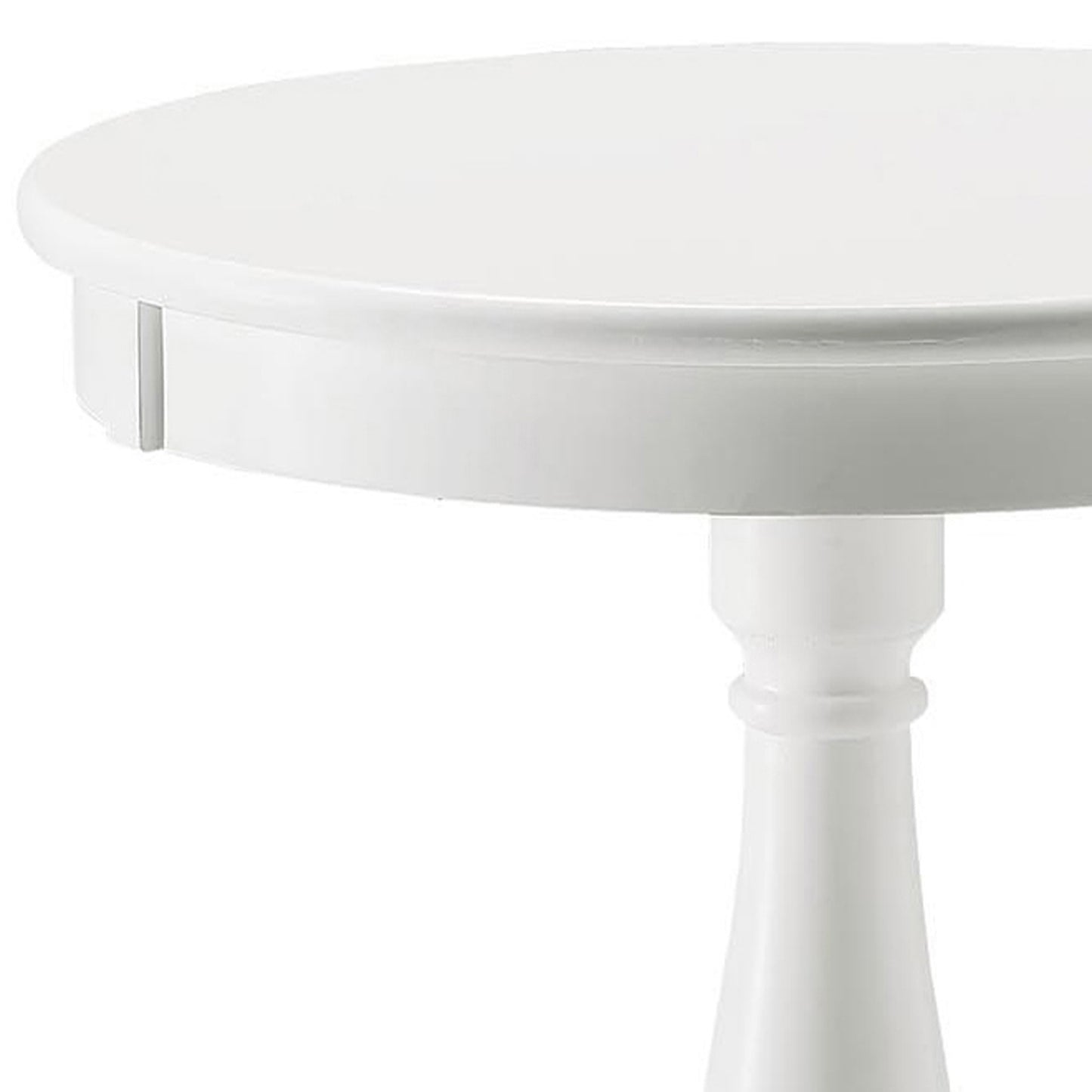 Closeup of a glossy white round side table with a turned pedestal base