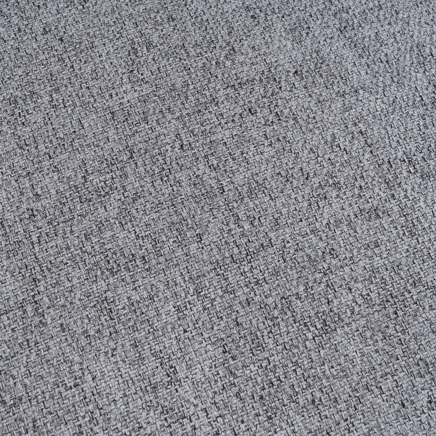 Closeup of textured grey upholstery fabric with a woven pattern perfect for furniture