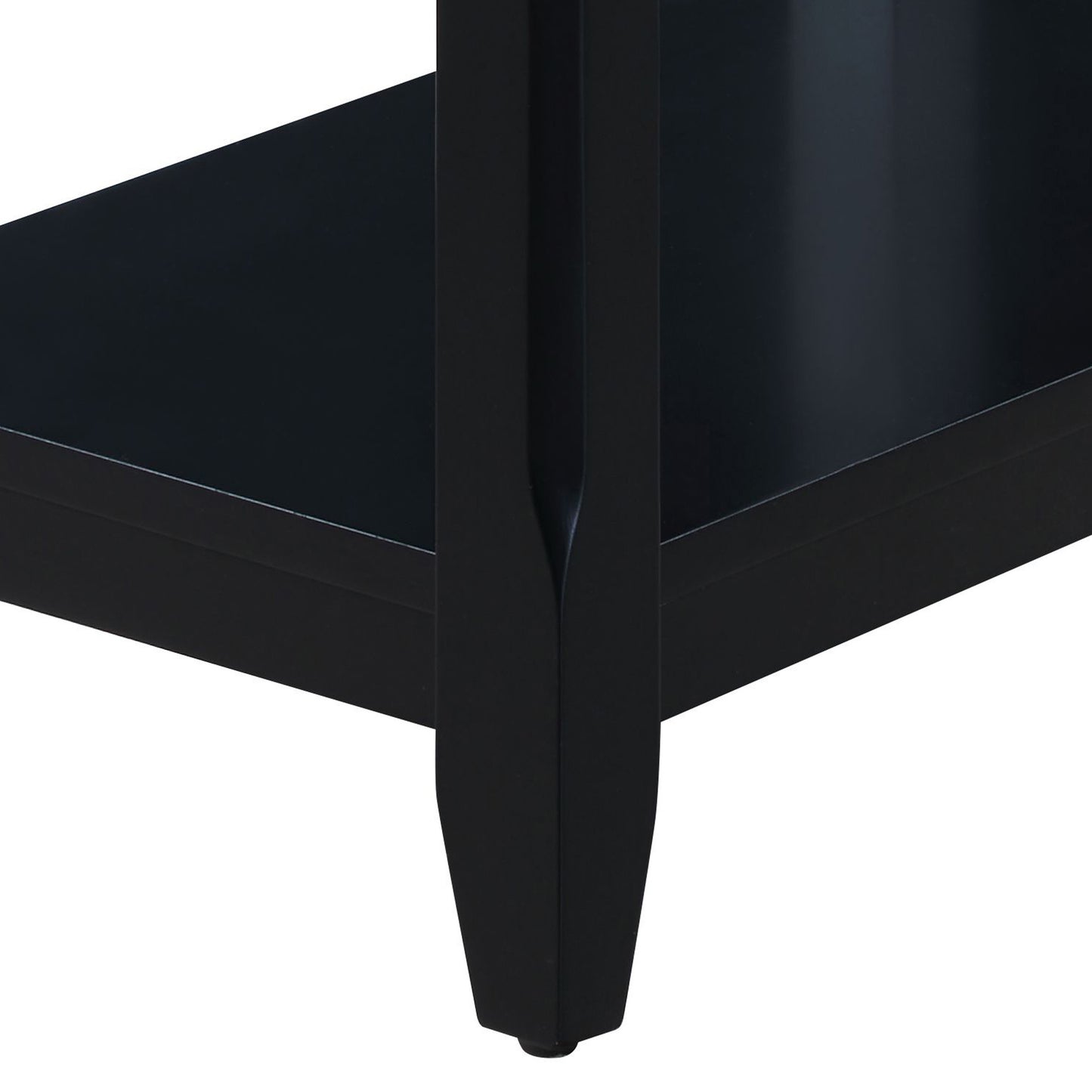 Black modern end table leg with carved detail showcasing sleek wood craftsmanship