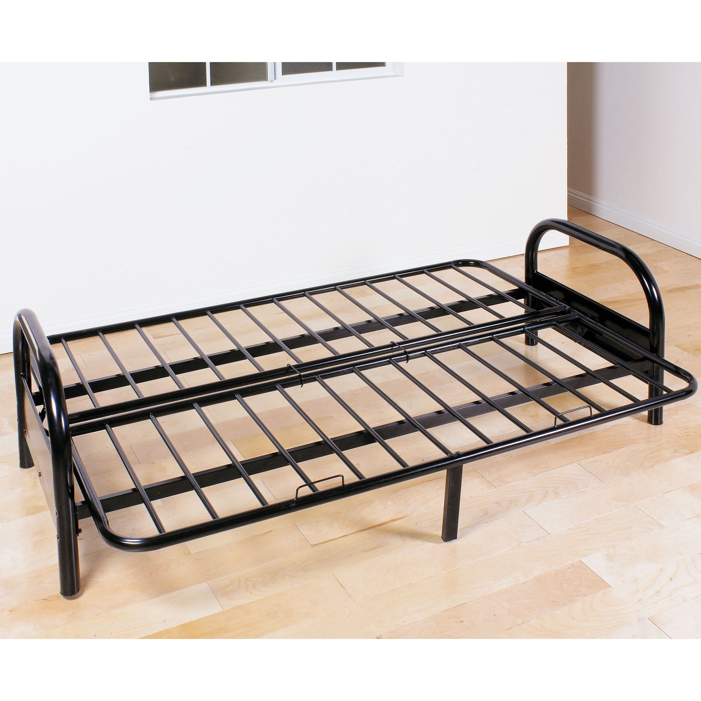 Black metal futon frame with slatted support ideal for small spaces
