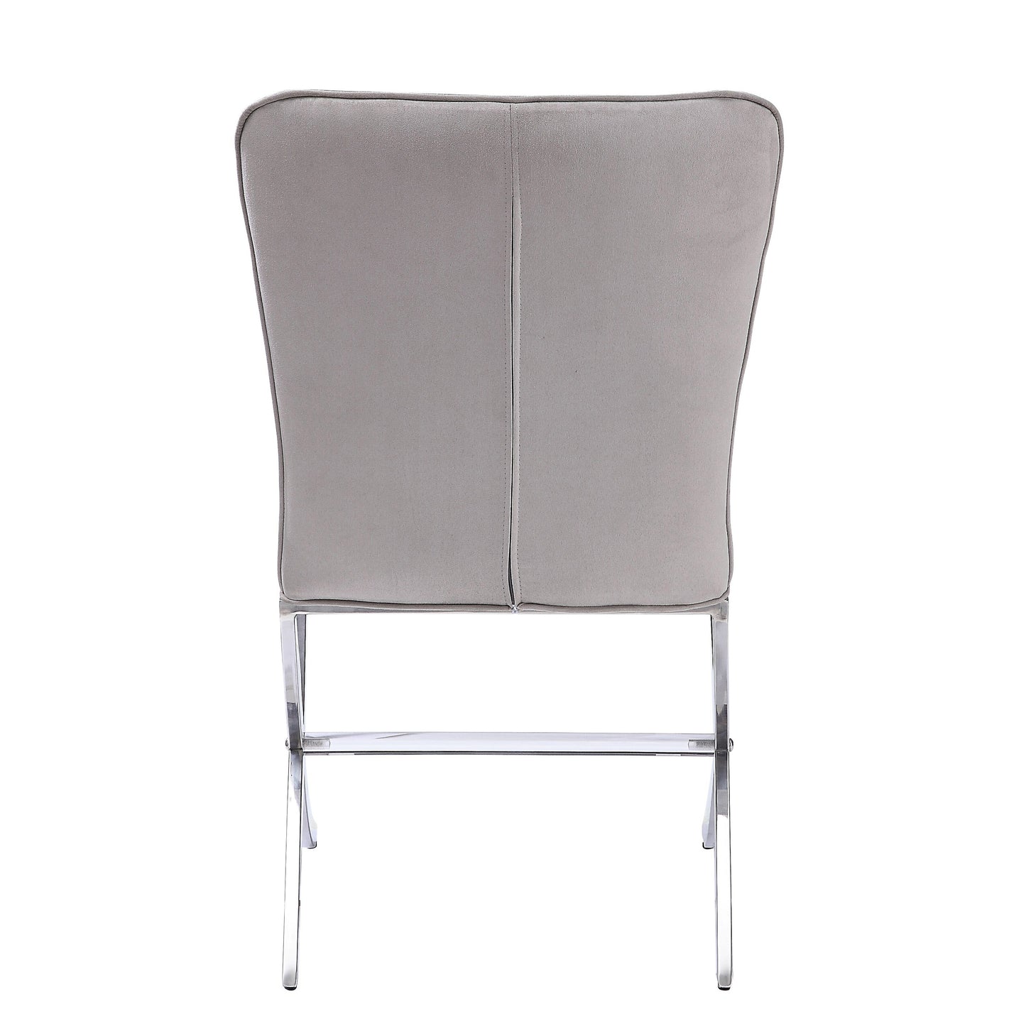 Back view of a gray velvet dining chair with polished chrome legs modern design