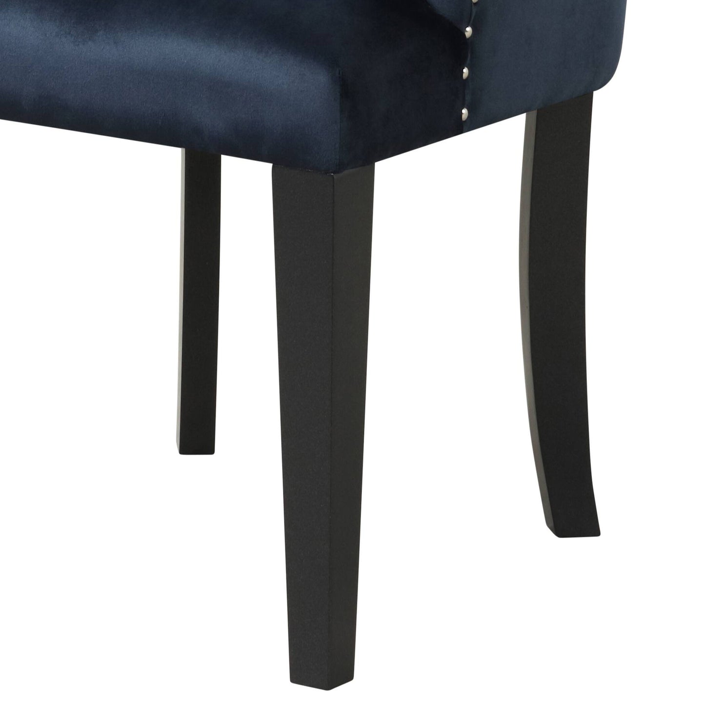 Navy velvet armchair legs with silver nailhead trim detailing