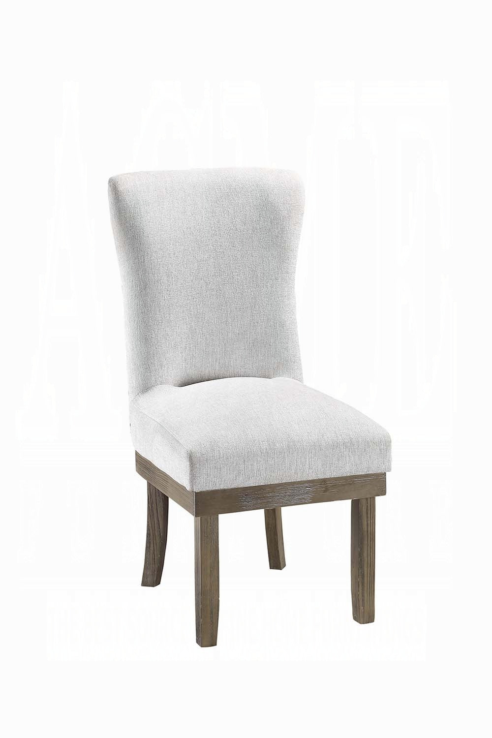 Upholstered dining chair in light gray fabric with a rustic wood base and tapered legs