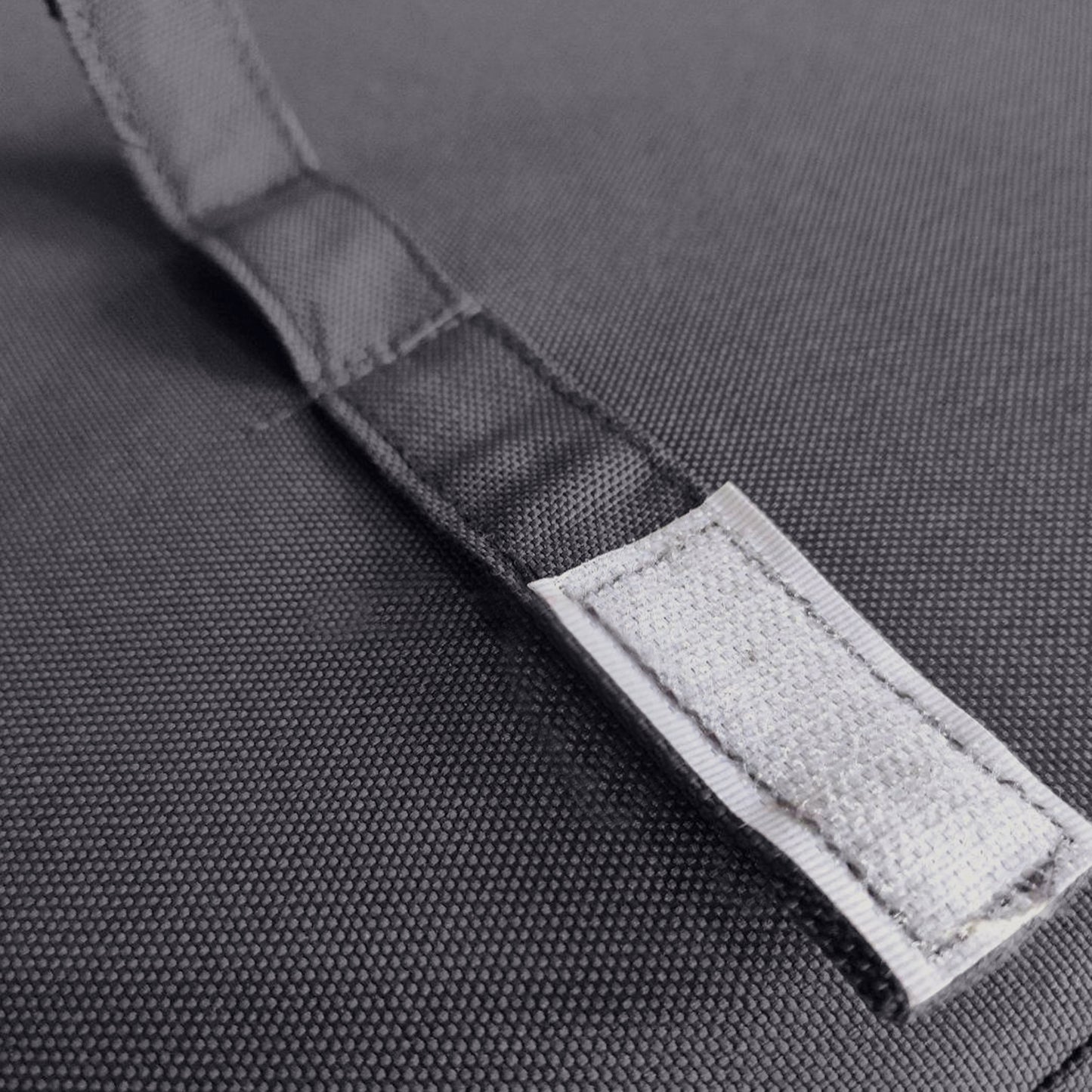 Closeup of durable gray canvas bag with a hookandloop fastener closure