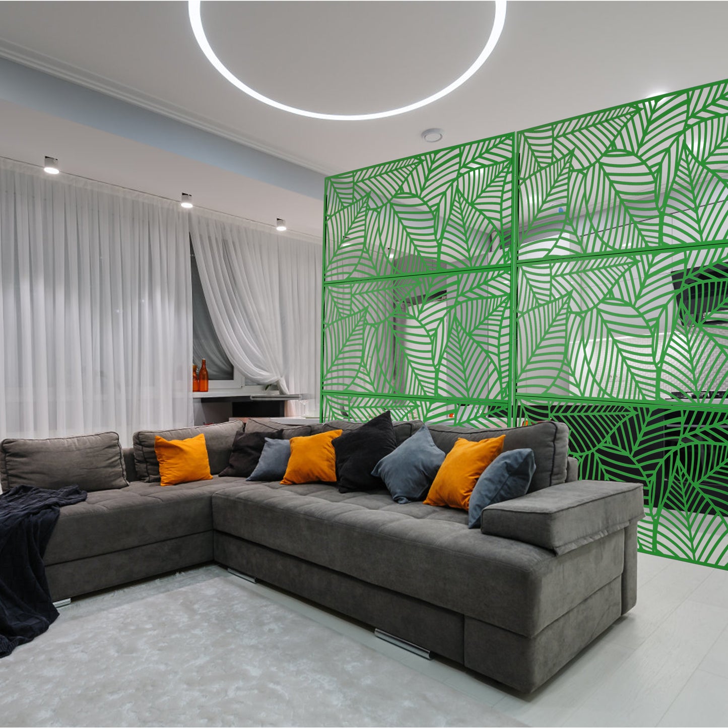 Green lasercut room divider with leaf pattern for contemporary living spaces
