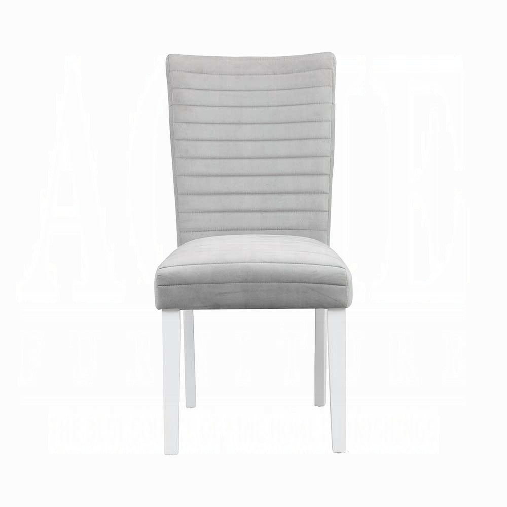 Light gray upholstered dining chair with horizontal stitching detail and white wooden legs