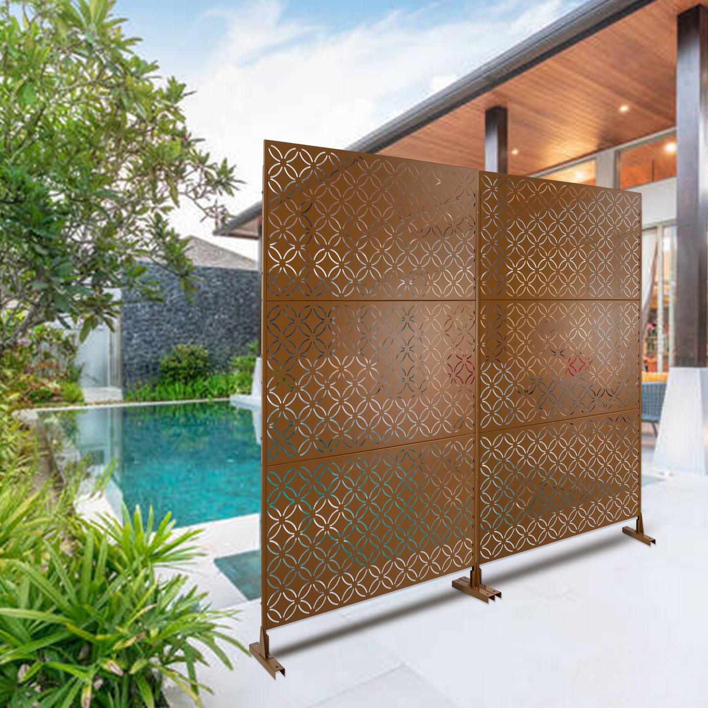 Decorative metal garden screen bronze with geometric lattice design offers privacy around a pool