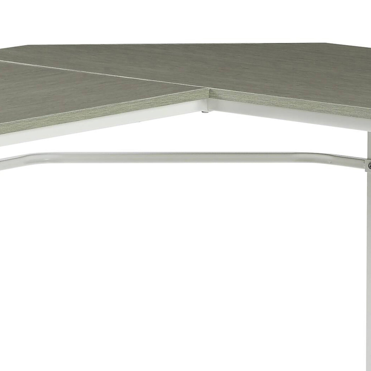 Closeup of a modern grey wood laminate corner desk with white metal legs and frame