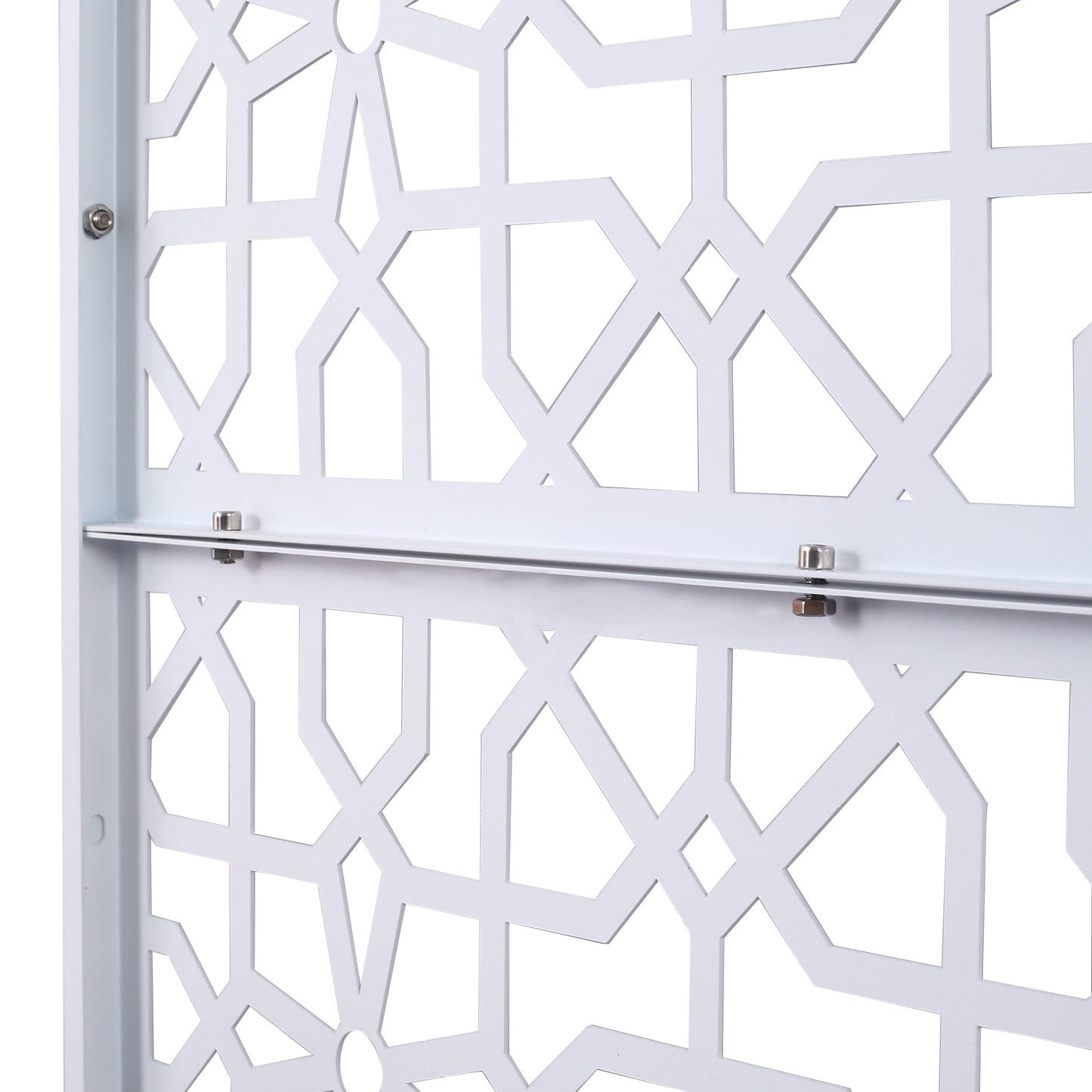 Closeup of white metal decorative screen panel with geometric star pattern