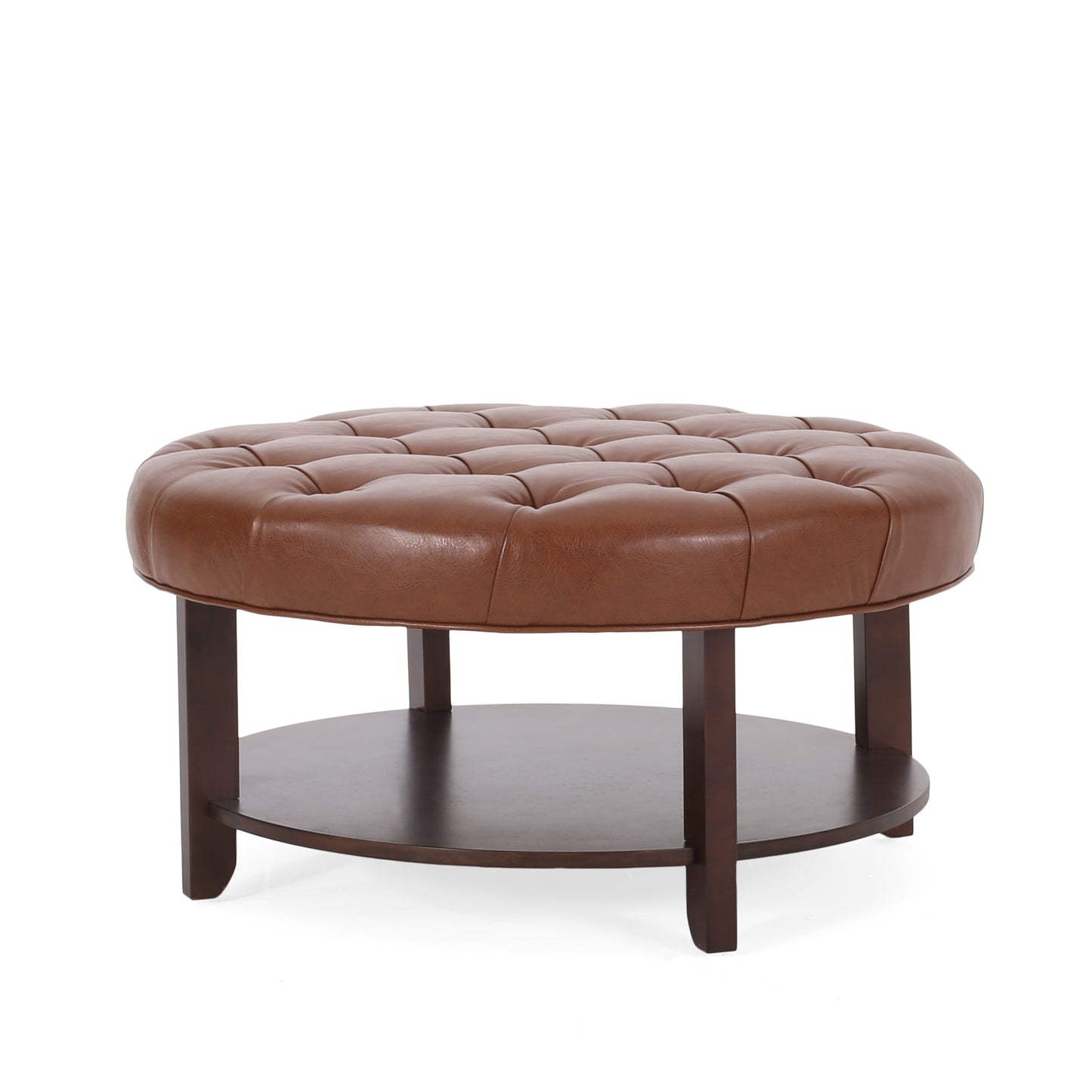 Tufted brown leather round ottoman with dark wood legs and shelf