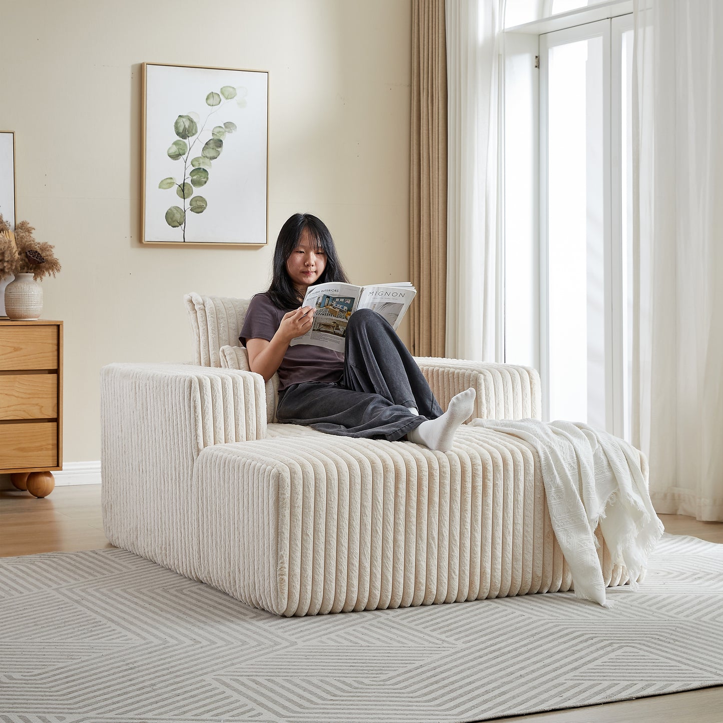 Textured cream corduroy modular sofa with plush fabric and rounded edges