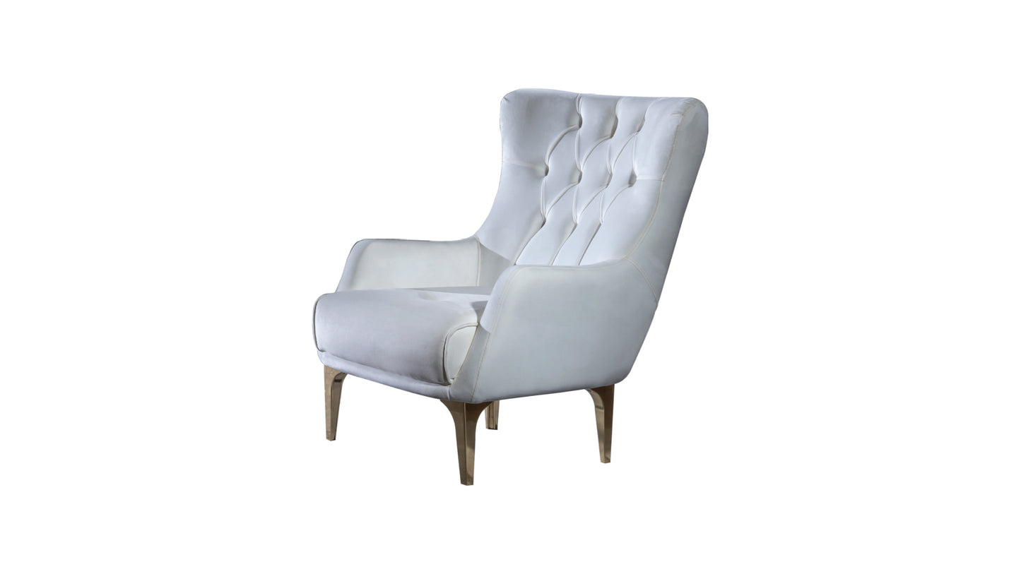 White tufted accent chair with gold metal legs a luxurious addition to any living space