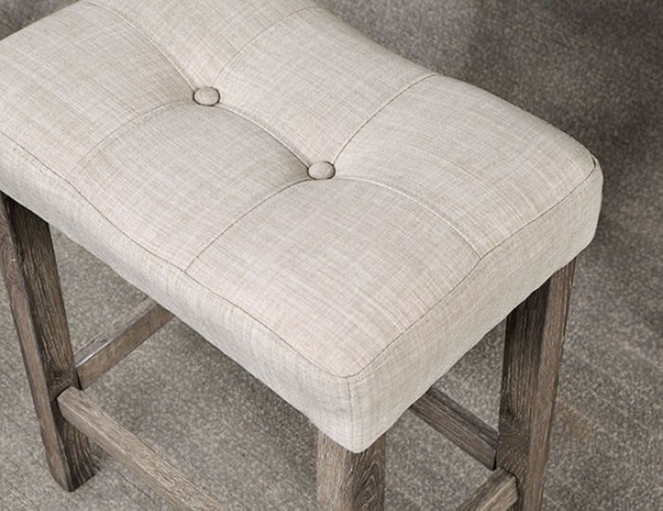 Tufted light beige linen bar stool with distressed wood legs