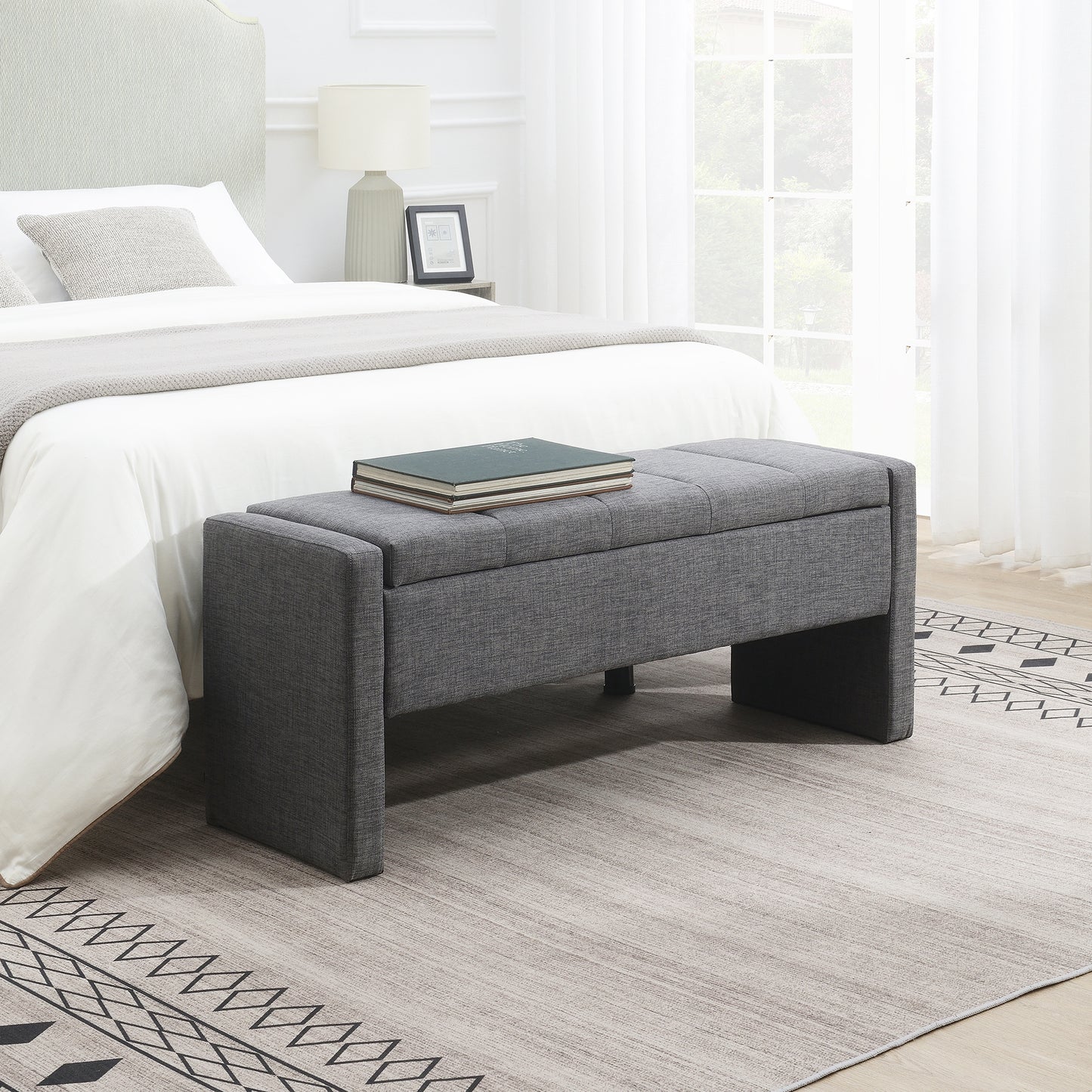 Tufted grey fabric storage bench with modern design