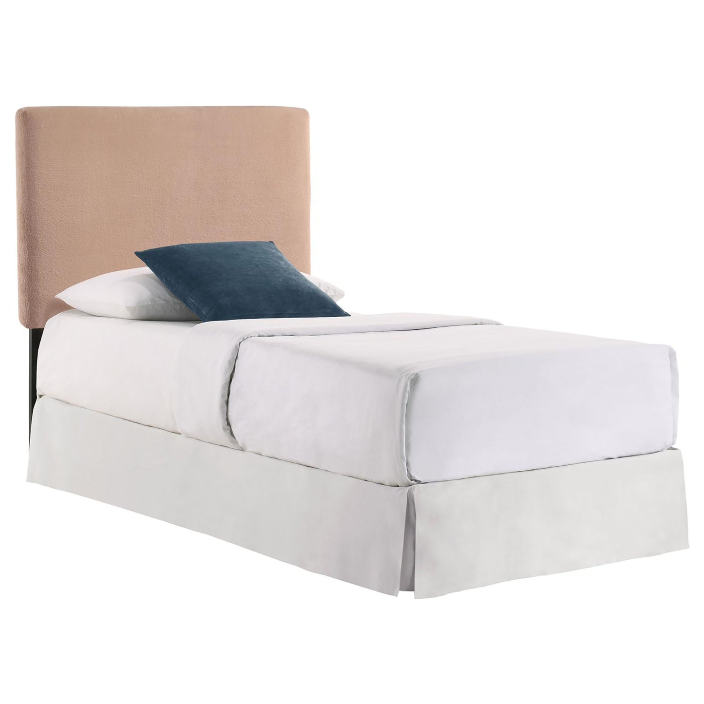 Tan upholstered twin headboard on a bed with white linens and a blue pillow