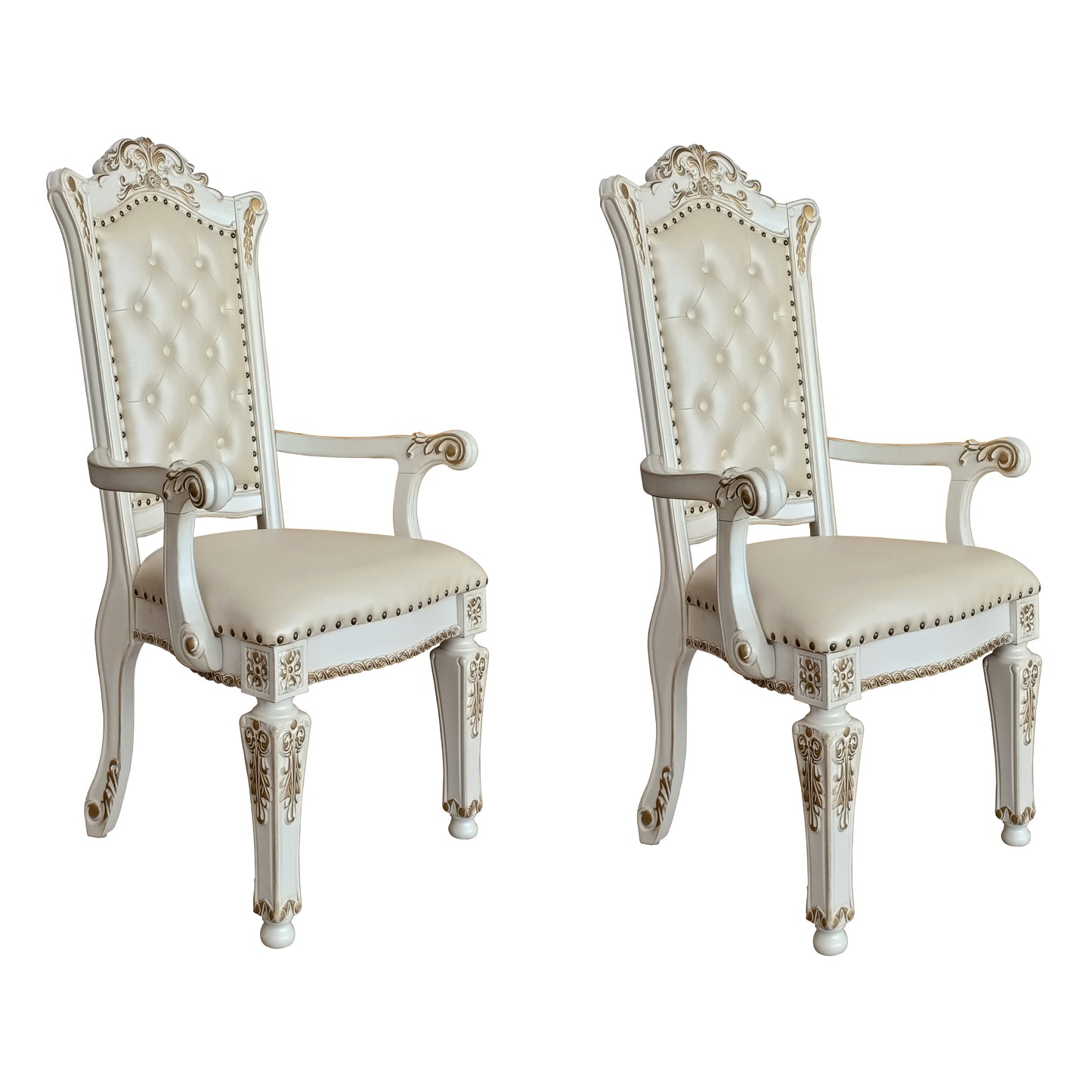 Ornate white tufted armchair with gold accents perfect for dining rooms