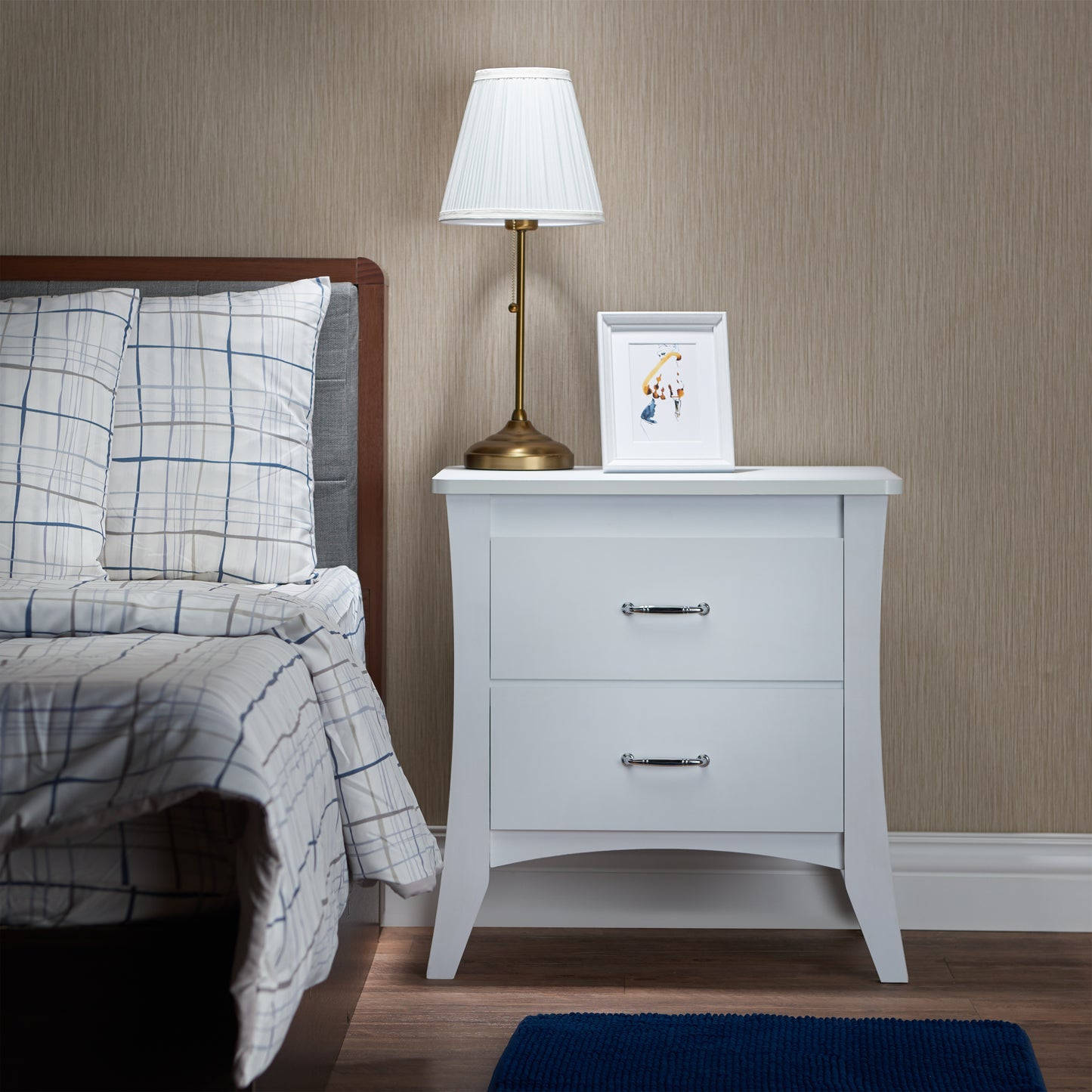 Modern white twodrawer nightstand with polished chrome handles and elegant curved legs