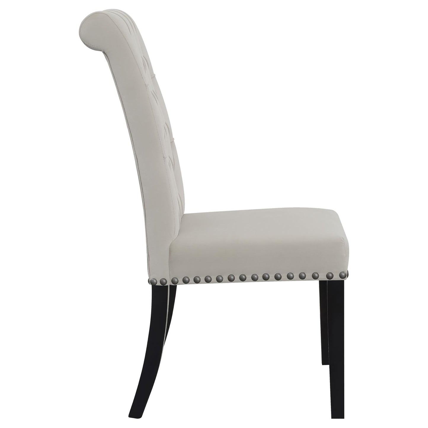 Grey tufted dining chair with silver nailhead trim and dark wood legs
