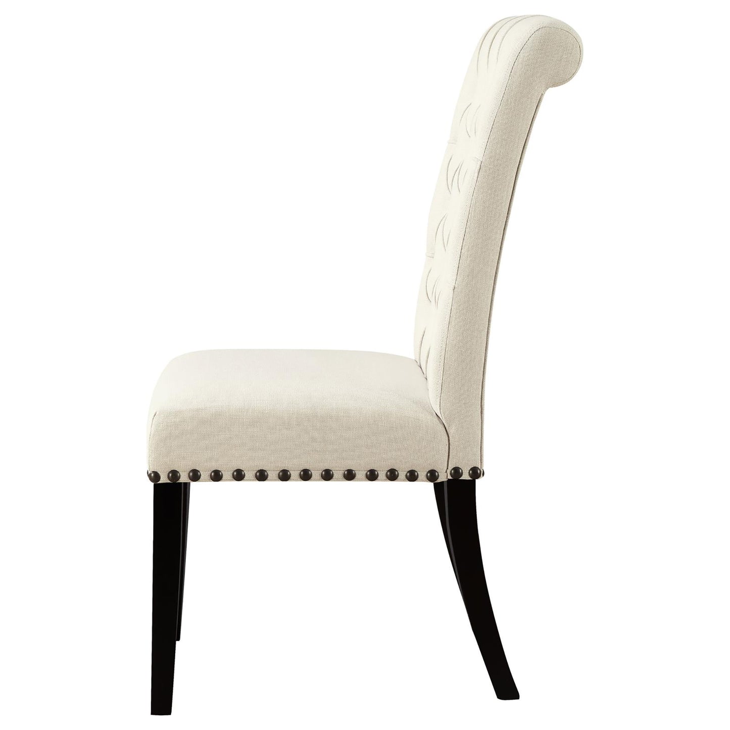 Tufted beige linen dining chair with dark wood legs and decorative nailhead trim