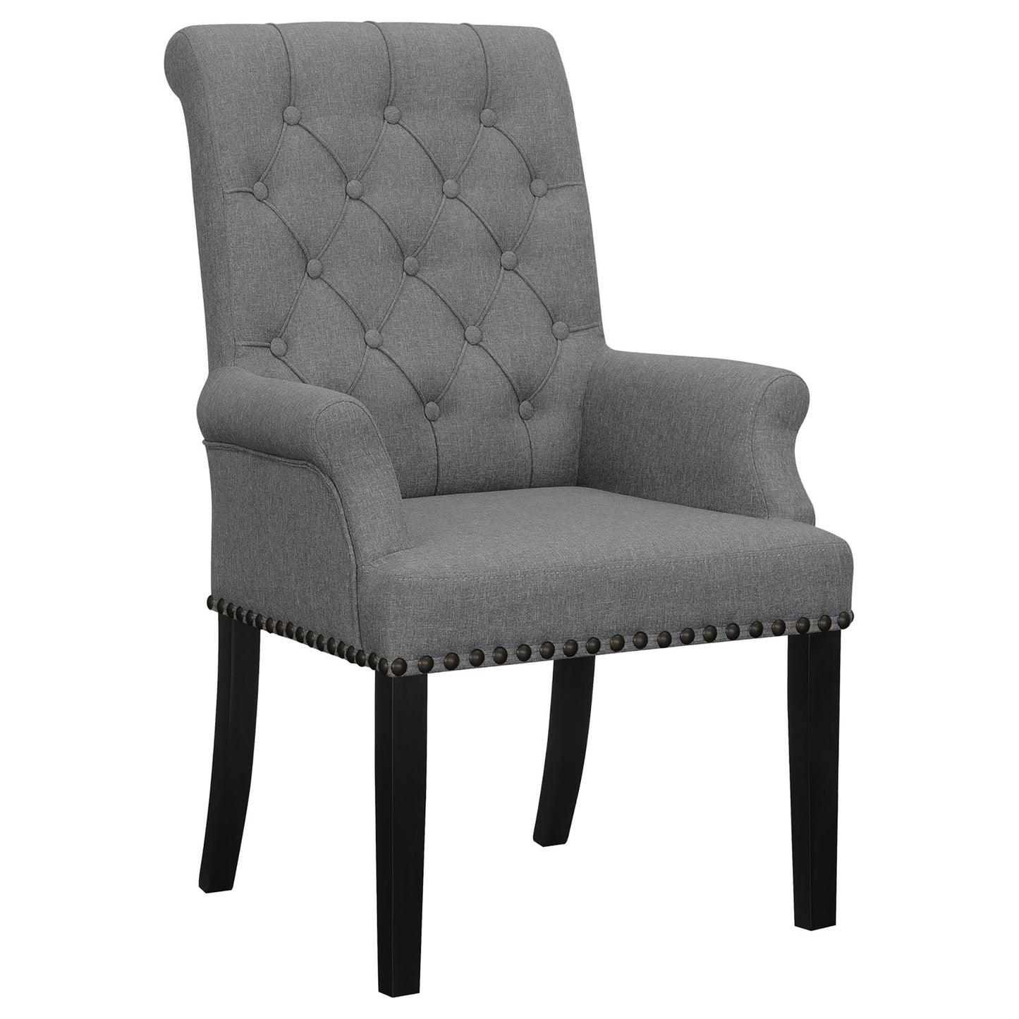 Tufted grey fabric accent chair with rolled arms and nailhead trim on dark wood legs