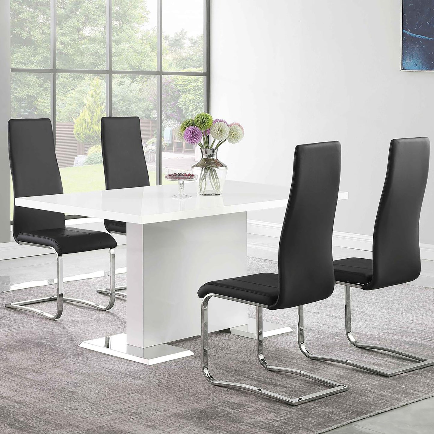 Modern white highgloss dining table with four black faux leather chairs