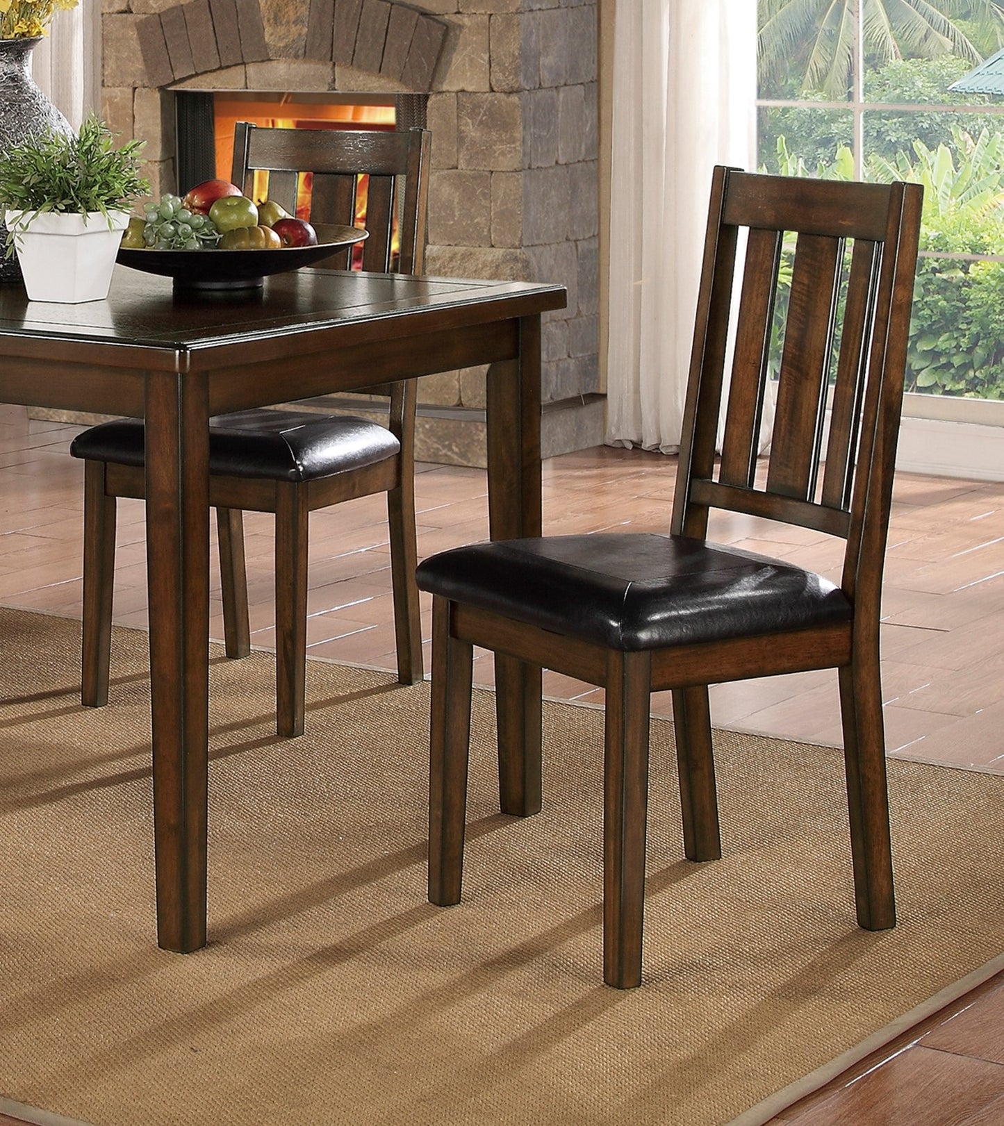 Solid wood dining chair with dark leather upholstered seat and slatted back